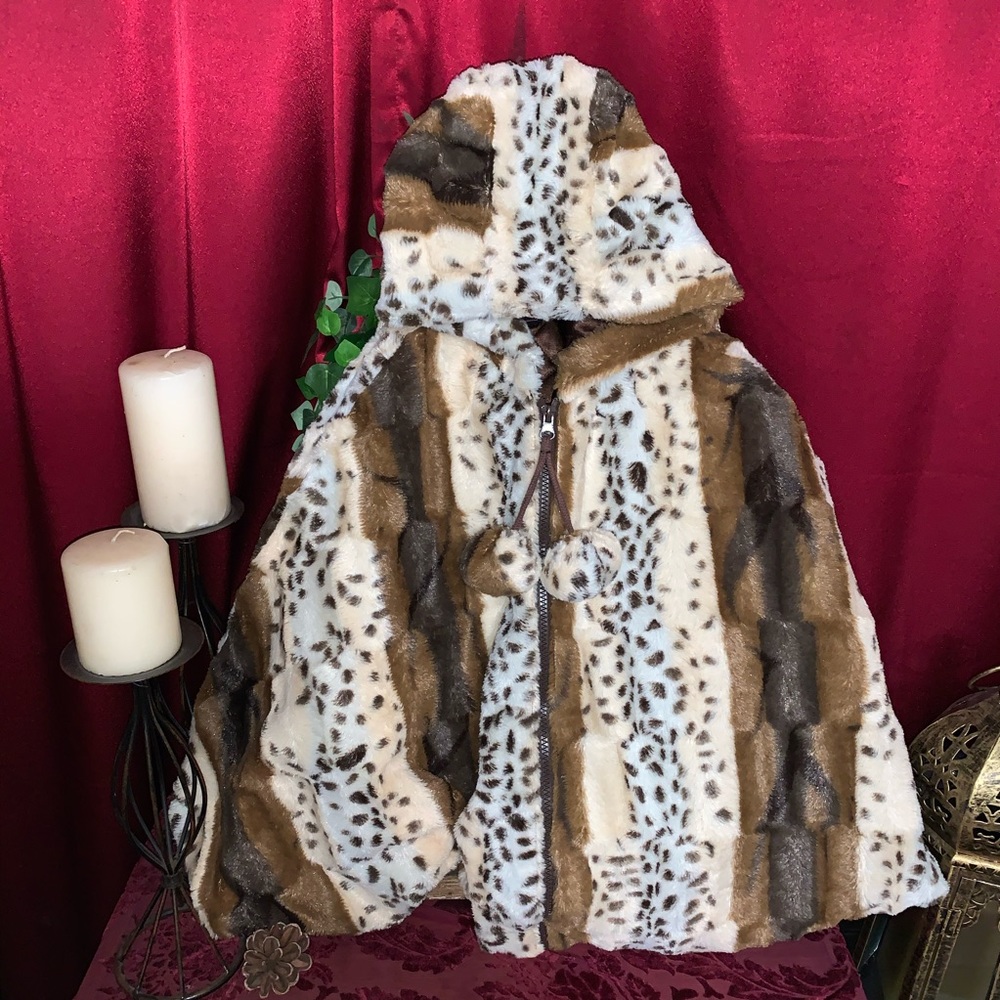 Lilly Patricia cape/poncho style faux fur coat.
